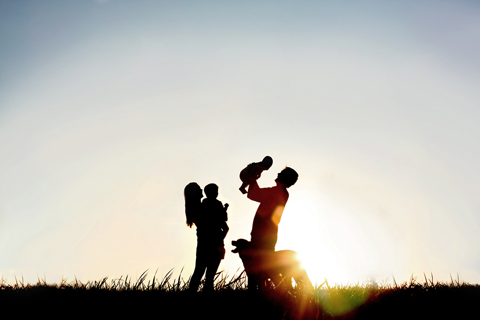 Adoptive Parents With Children And Dog