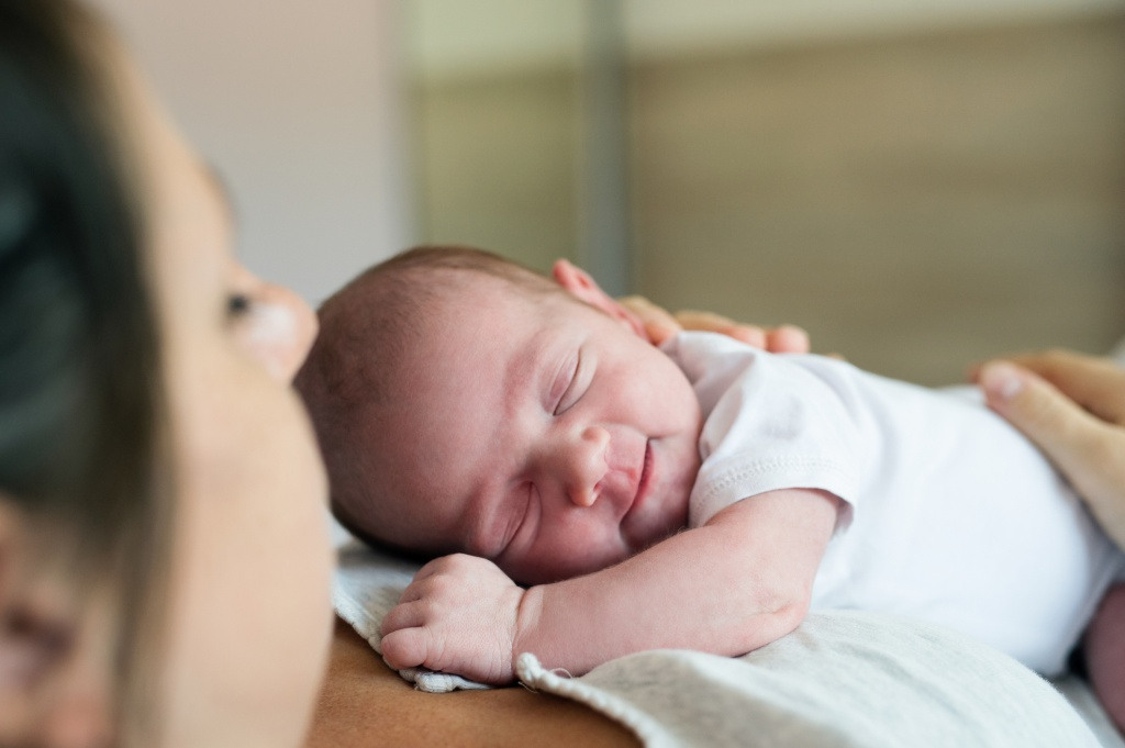 Birthmother And Newborn At The Hospital