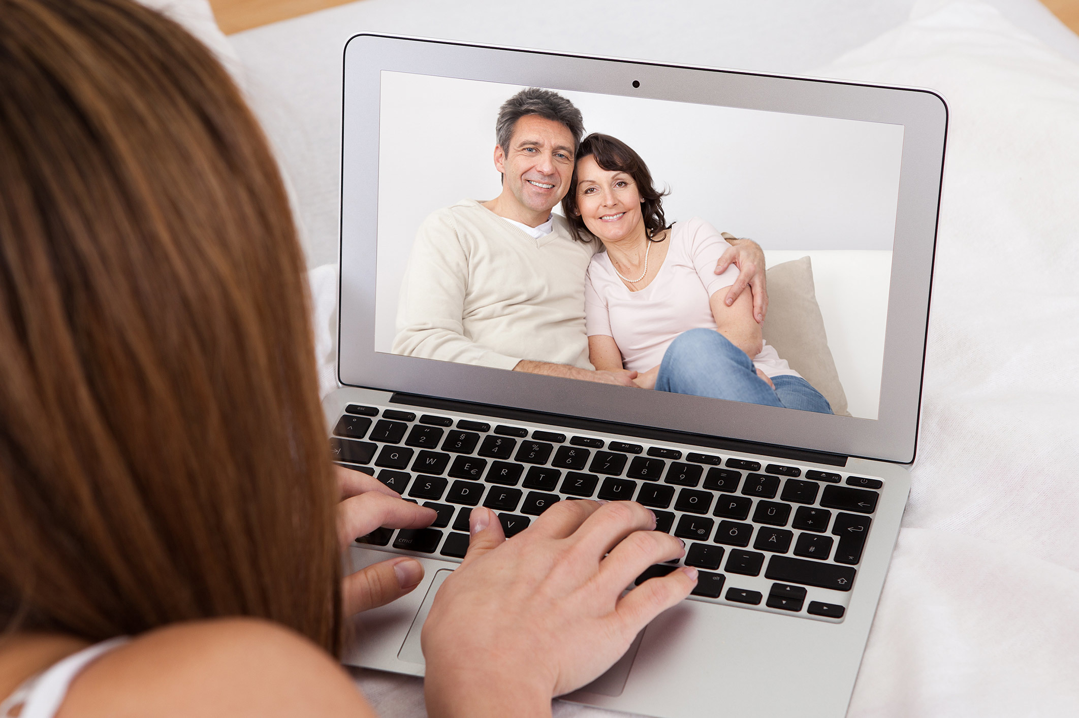 Birthparent chatting with adoptive parents